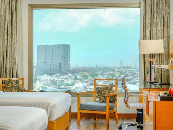 Courtyard by Marriott Gurugram Downtown : photo 9 de la chambre chambre lits jumeaux deluxe