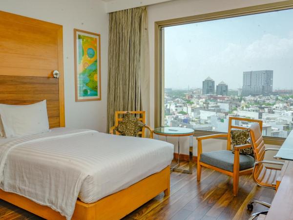 Courtyard by Marriott Gurugram Downtown : photo 10 de la chambre chambre lit king-size deluxe