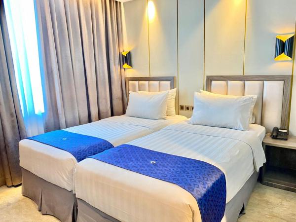 Arthama Tanah Abang Jakarta : photo 4 de la chambre chambre double ou lits jumeaux standard