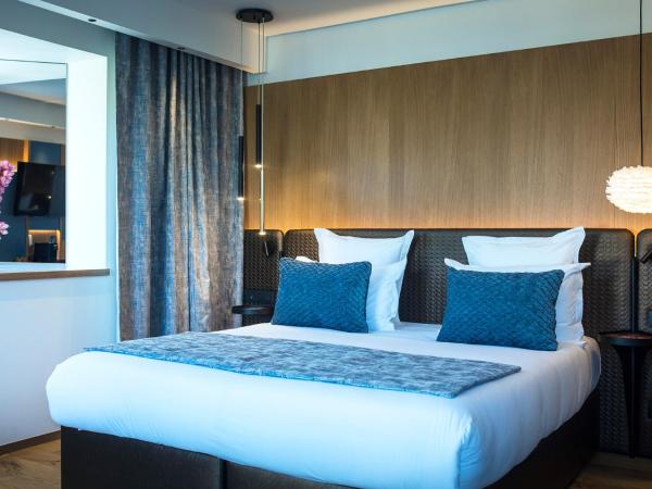 Le Pélican : photo 2 de la chambre chambre double ou lits jumeaux prestige avec terrasse - vue sur lac