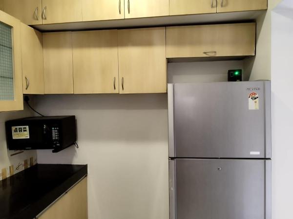 JUST HOME 2BHK : photo 9 de la chambre chambre double ou lits jumeaux deluxe avec balcon