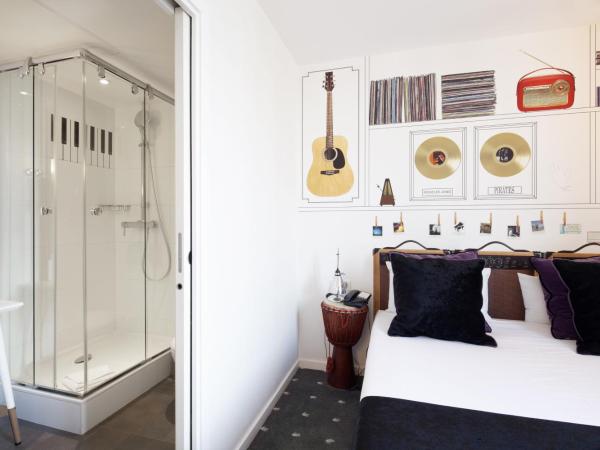 Hôtel du Triangle d'Or : photo 7 de la chambre chambre double deluxe