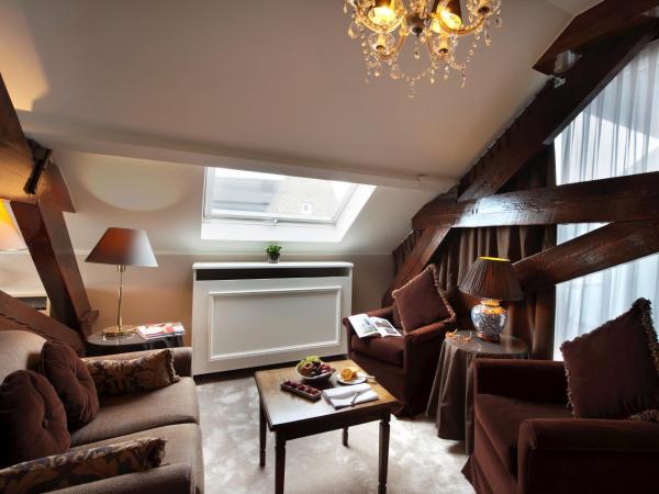 Relais & Châteaux Hotel Heritage : photo 3 de la chambre suite junior - vue sur beffroi