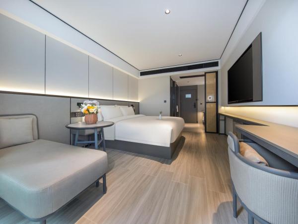 Gongxili - Xige Hotel : photo 3 de la chambre chambre lit king-size deluxe avec vue