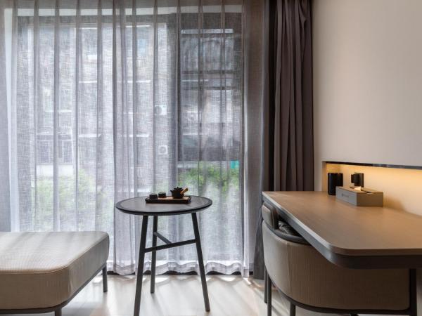 Gongxili - Xige Hotel : photo 4 de la chambre chambre supérieure lit queen-size