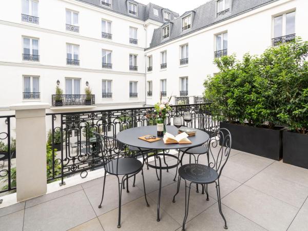 Hôtel & SPA Napoléon : photo 4 de la chambre suite avec terrasse et accès au spa