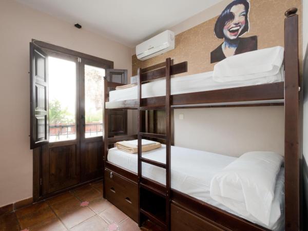 Oasis Backpackers' Hostel Granada : photo 6 de la chambre lit dans dortoir mixte de 4 lits