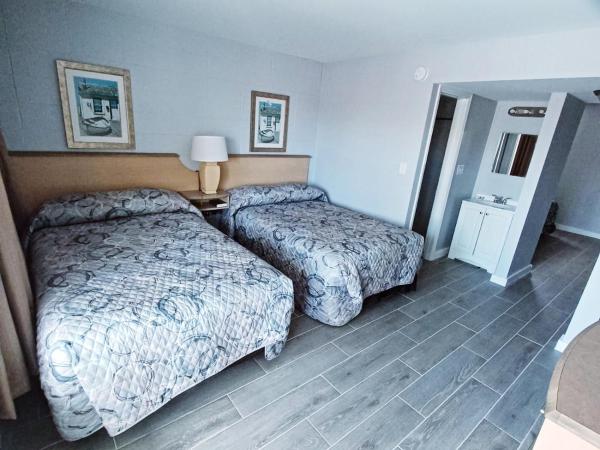 Palmsbythebeach : photo 4 de la chambre chambre triple confort avec douche