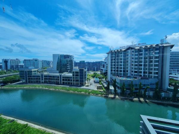 COZY Studio at Ming Garden Residence : photo 9 de la chambre chambre lits jumeaux - vue sur ville