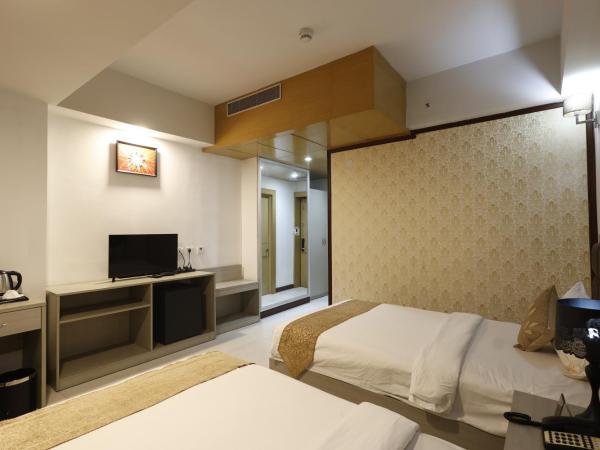 Aristocrat Hotel, New Town, Kolkata : photo 3 de la chambre chambre lits jumeaux deluxe