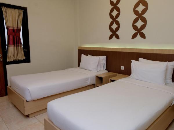 Mawar Asri Hotel : photo 2 de la chambre chambre lits jumeaux standard