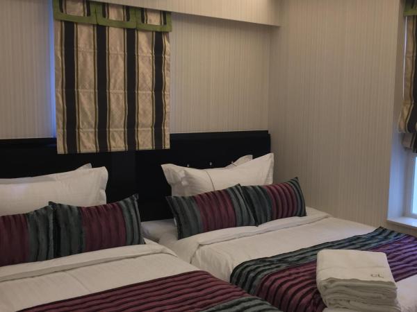 Seasons Hotel - Causeway Bay : photo 3 de la chambre chambre quadruple