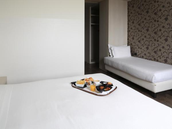 Klima Hotel Milano Fiere : photo 8 de la chambre chambre triple