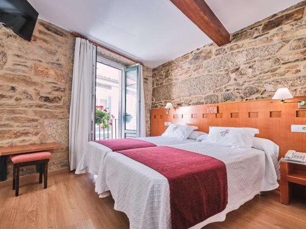 Hotel Entrecercas : photo 1 de la chambre chambre triple