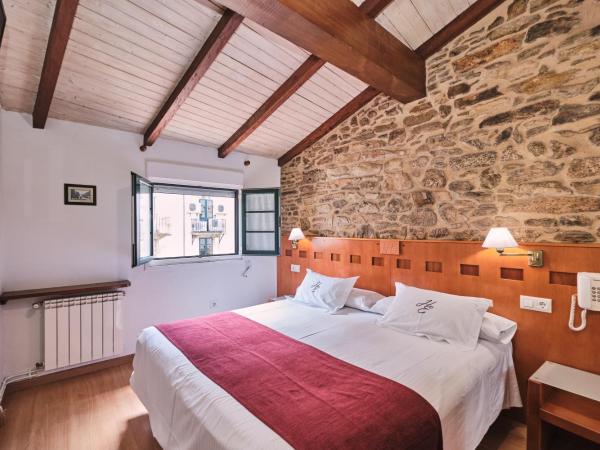 Hotel Entrecercas : photo 4 de la chambre chambre lits jumeaux