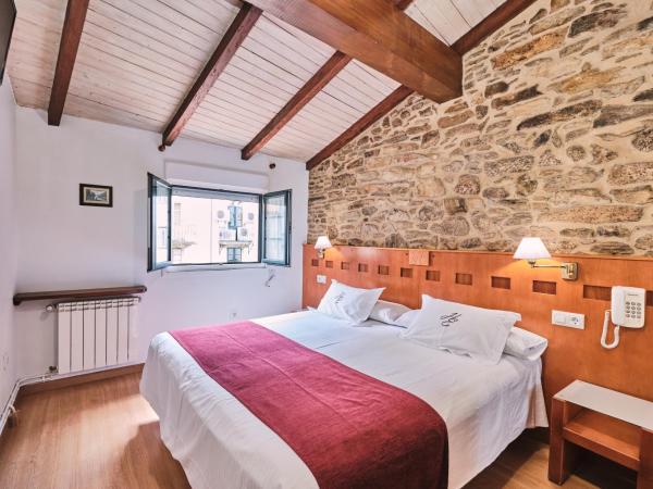 Hotel Entrecercas : photo 5 de la chambre chambre lits jumeaux