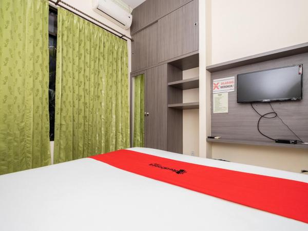 RedDoorz Plus @ Grace Residence Surabaya : photo 9 de la chambre chambre double standard