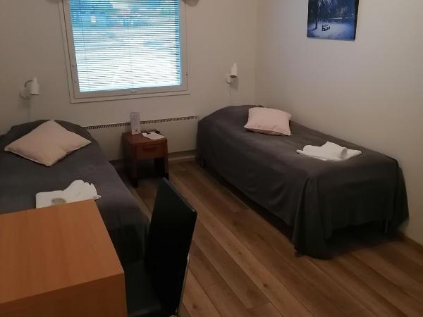 Hostel Tikka : photo 6 de la chambre chambre lits jumeaux avec salle de bains commune