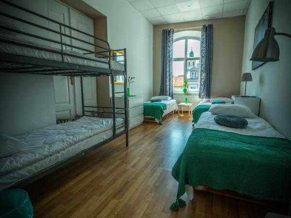 Hostel Pod Basztą : photo 4 de la chambre lit simple dans dortoir pour femmes