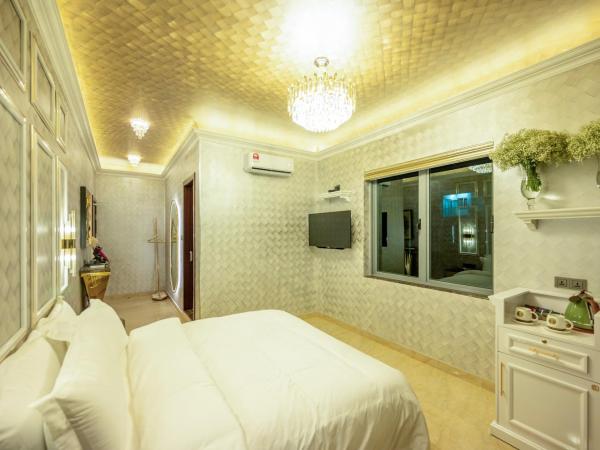 Ritz Residence @ Imago Loft B 7th Floor : photo 3 de la chambre chambre lit king-size deluxe