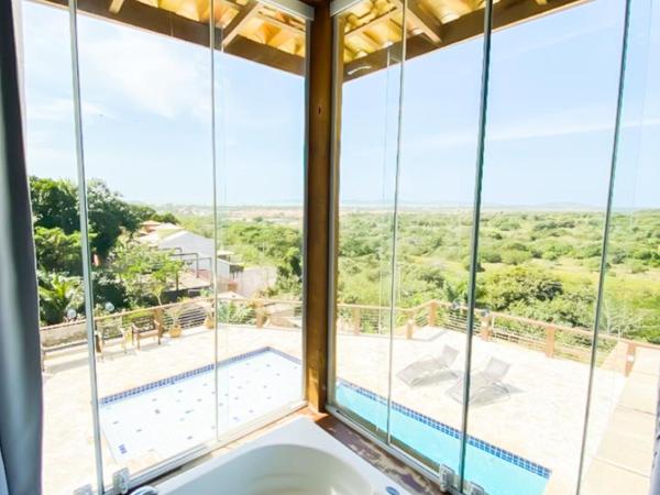 Pousada Preciosa : photo 7 de la chambre suite deluxe avec baignoire spa