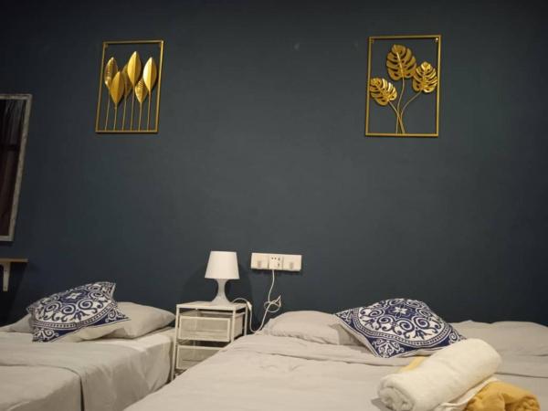 Wayton Express : photo 3 de la chambre chambre triple avec salle de bains commune