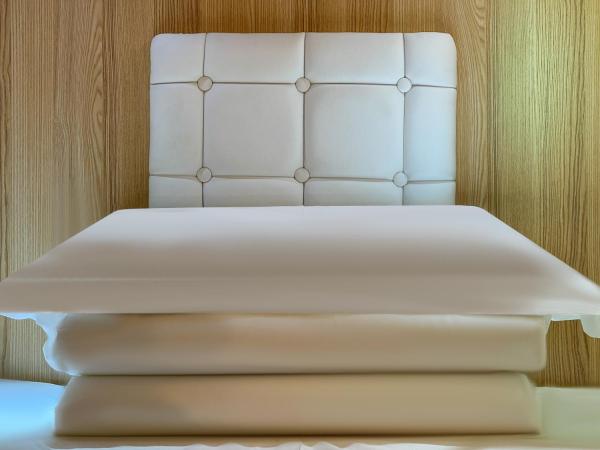 Airone Capsule Hotel : photo 4 de la chambre lit simple dans dortoir mixte