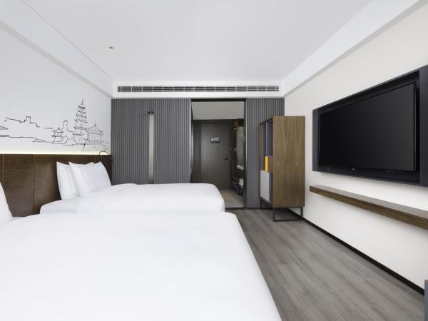UrCove by Hyatt Xi'an Hi-Tec : photo 4 de la chambre chambre lits jumeaux deluxe