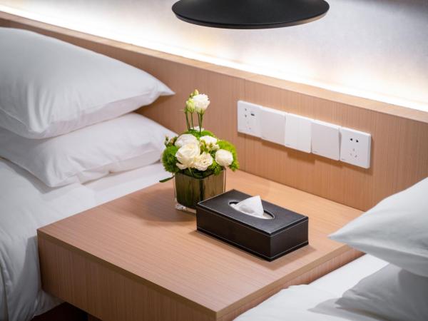 Quantum Inn - Hangzhou East Railway Station : photo 3 de la chambre chambre lits jumeaux deluxe