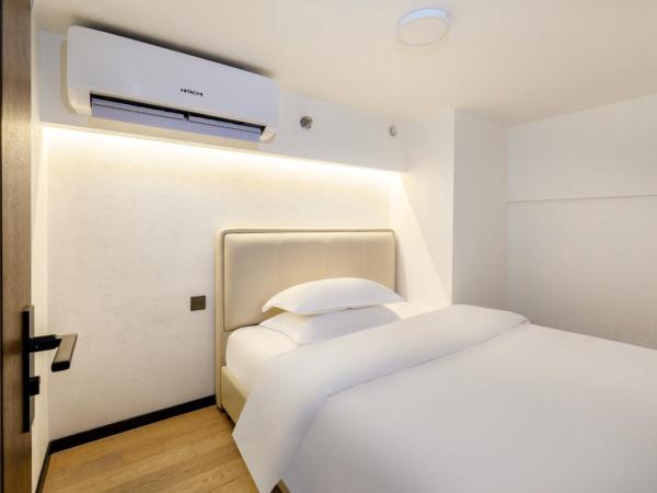 Xinghe Times Apartment - Shenzhen North Railway Station : photo 2 de la chambre appartement 2 chambres