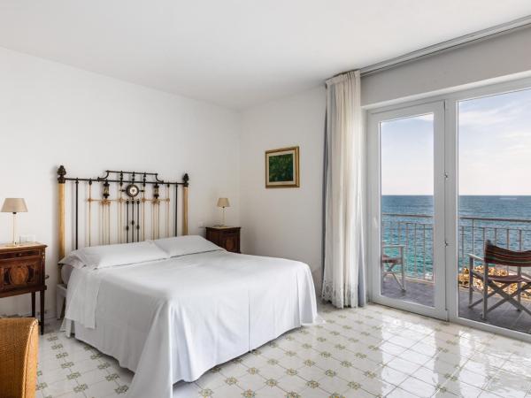 Giuggiulena : photo 1 de la chambre chambre double avec balcon - vue sur mer