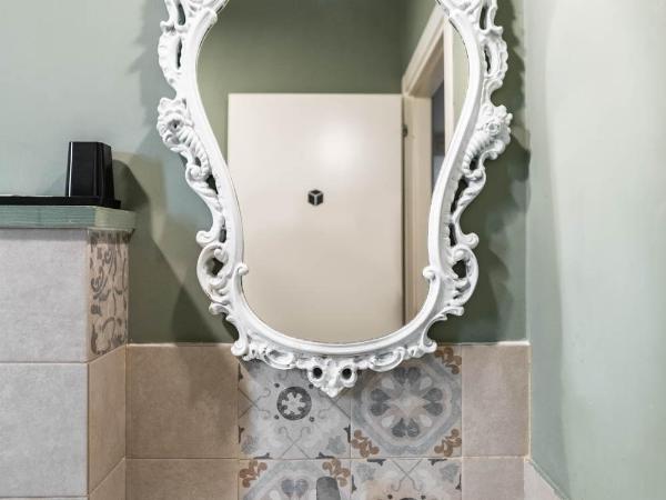 La Piazzetta Rooms & Apartments : photo 8 de la chambre chambre double ou lits jumeaux avec salle de bains privative externe