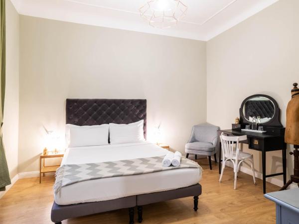 La Piazzetta Rooms & Apartments : photo 2 de la chambre deux chambres adjacentes avec salle de bains privative séparée