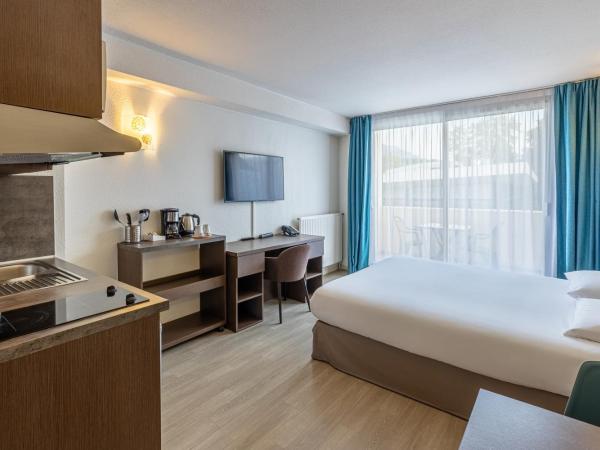 Les Loges du Park : photo 1 de la chambre studio avec balcon