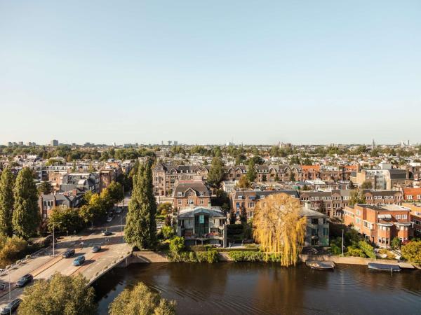 Hilton Amsterdam : photo 3 de la chambre chambre lit king-size de luxe - vue sur canal