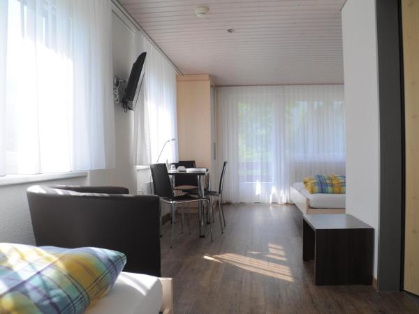 Ferien- und Familienhotel Alpina Adelboden : photo 1 de la chambre chambre triple