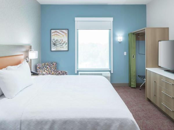 Home2 Suites By Hilton Orlando Airport : photo 1 de la chambre suite lit king-size - accessible aux personnes à mobilité réduite - non-fumeurs