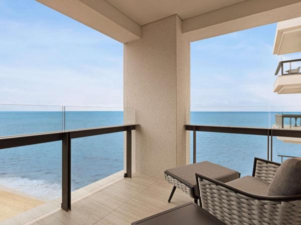 Hilton Cancun, an All-Inclusive Resort : photo 1 de la chambre suite lit king-size deluxe - côté océan