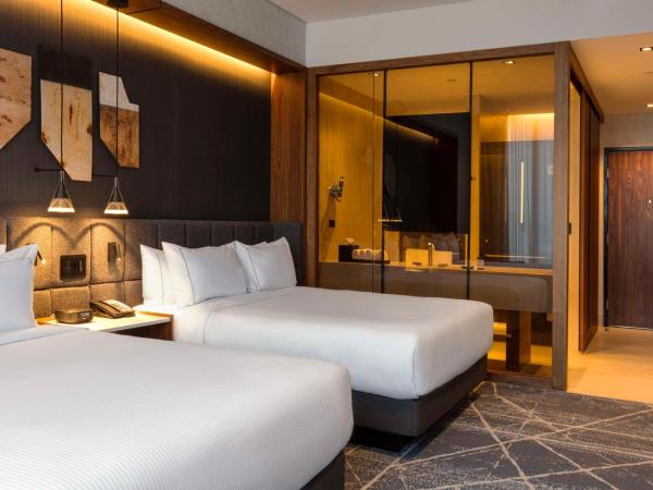 Hilton Monterrey Valle : photo 6 de la chambre chambre deluxe avec 2 lits queen-size