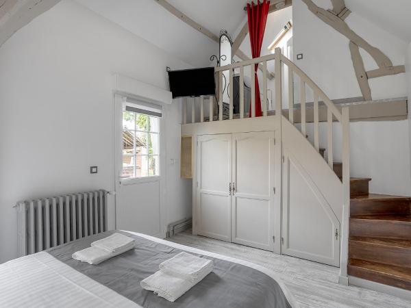 Chambres d'hôte - Clos d'Allonne : photo 1 de la chambre chambre avec mezzanine