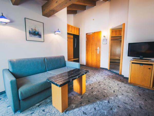 Villa Waldperlach by Blattl : photo 2 de la chambre studio lit king-size avec canapé-lit