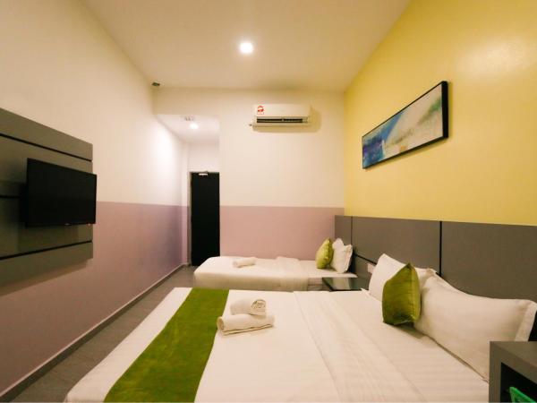 Travelland Hotel : photo 4 de la chambre chambre triple sans fenêtre