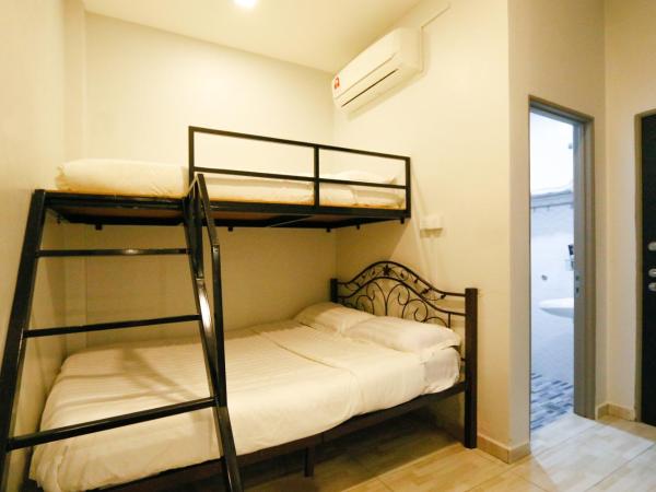 Travelland Hotel : photo 2 de la chambre suite familiale