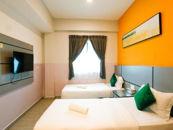 Travelland Hotel : photo 4 de la chambre chambre lits jumeaux deluxe