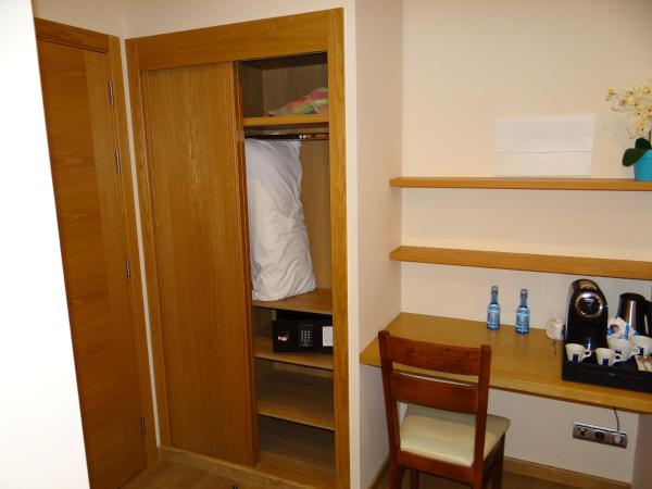 Pensión O Códice : photo 4 de la chambre chambre lits jumeaux supérieure