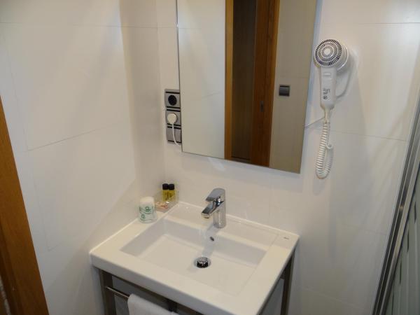 Pensión O Códice : photo 4 de la chambre chambre lits jumeaux supérieure