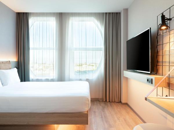 Moxy The Hague : photo 2 de la chambre chambre lit queen-size moxy - vue sur ville