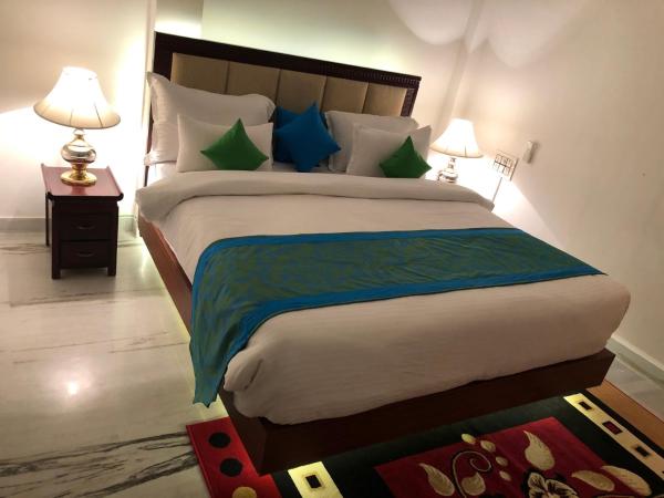 Hotel Nirvana Lakeside : photo 1 de la chambre chambre double deluxe (2 adultes + 1 enfant)