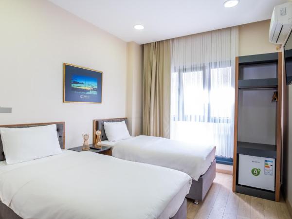 Campus Boutique Hotel : photo 2 de la chambre chambre lits jumeaux