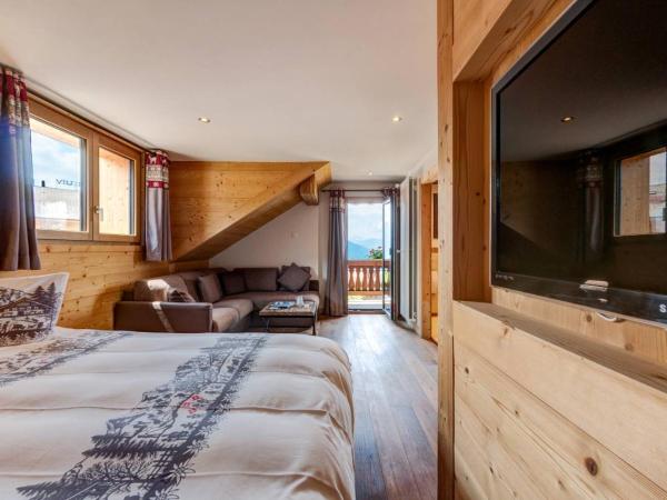 Alpe Fleurie Hôtel & Restaurant : photo 8 de la chambre chambre double ou lits jumeaux avec balcon